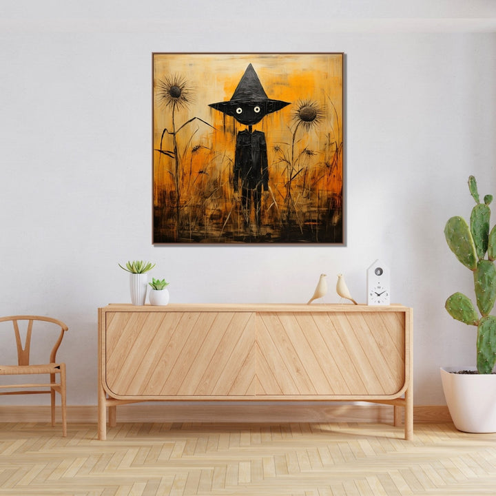 A black scarecrow stands as a sentinel in the midst of a desolate, withered crop set against a haunting orange background : Living room Paintings