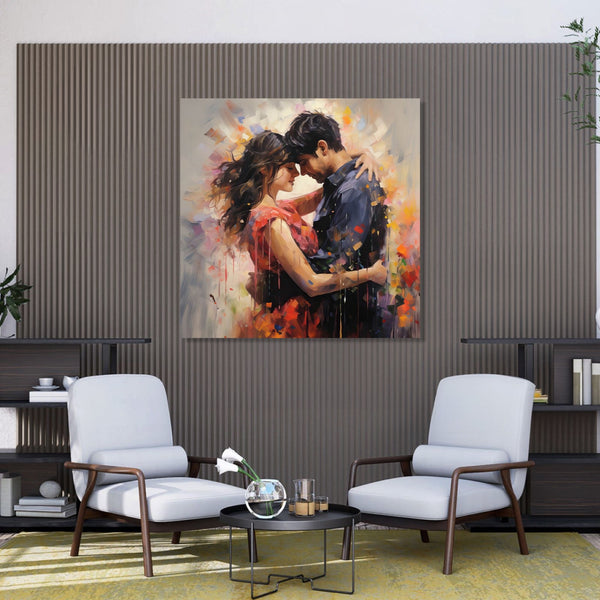 A couple standing and facing each other and embracing. Girl in red dress and boy in blue shirt. Light abstract background.