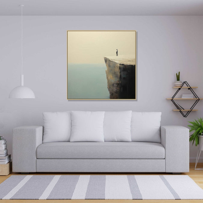 A lone man stands at the precipice of a cliff, gazing into the vast expanse of the sea below : Personal room Paintings