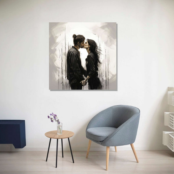 A man with hair bun black cloths and a woman in black dress kissing with other, side view, white and grey background