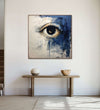 An open eye emerges against an abstract backdrop of deep, contemplative dark blue and the purity of white : Living room Paintings