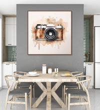 Painting for Home:An old camera in black and brown colour , bsplashed brown colour against background of off white