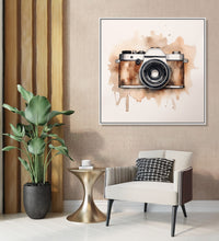 Painting for Drawing Room: An old camera in black and brown colour , bsplashed brown colour against background of off white