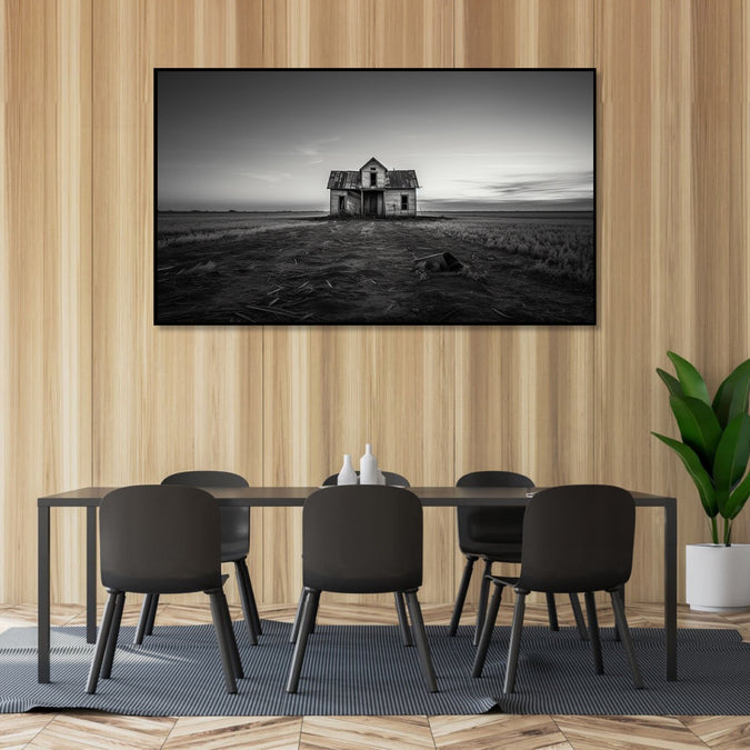 Painting for Bedroom: Minimalistic Monochrome with a delapidated gouse in the middle of a grassland ad clear sky