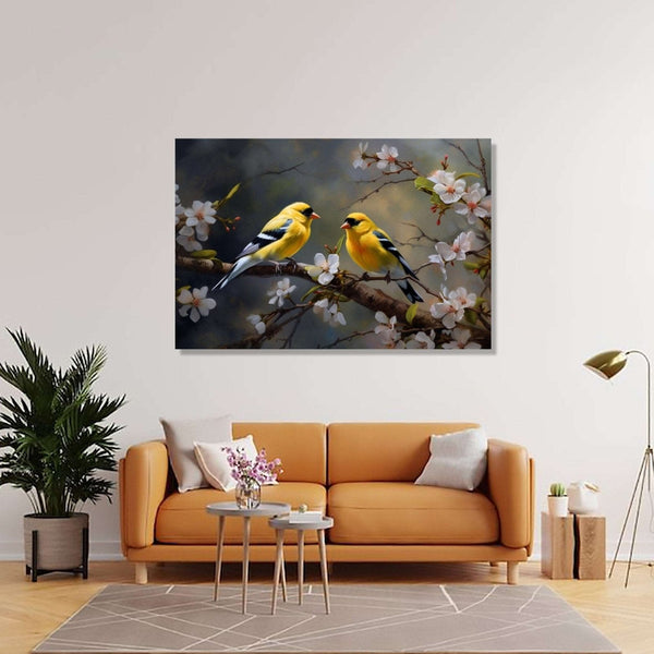 Two goldfinch birds facing each other and sitting in cherry blossom branches. Dark green, grey background