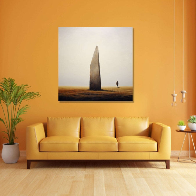 solitary figure stands beside a towering vertical stone henge