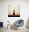 solitary figure stands beside a towering vertical stone henge : Dining room Painting